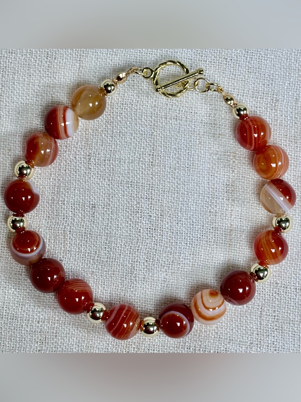 Elegant bracelet-natural banded Carnelian/red Agate,gold filled beads.8”. NWOT